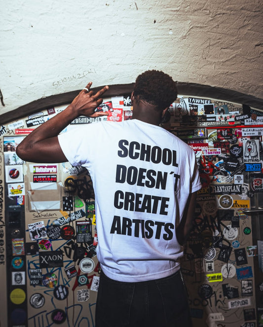 SCHOOL DOESN'T CREATE ARTISTS